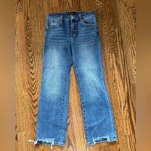 Risen High Rise Step Hem Jeans